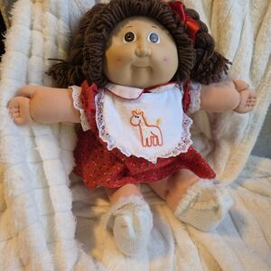 Cabbage Patch Kid HM2 with Original Red Dress and Brown Hair.